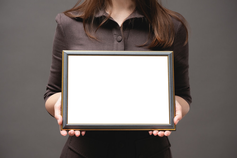 Blank,Diploma,Certificate,Mockup.,Woman,With,Empty,Photo,Frame,With